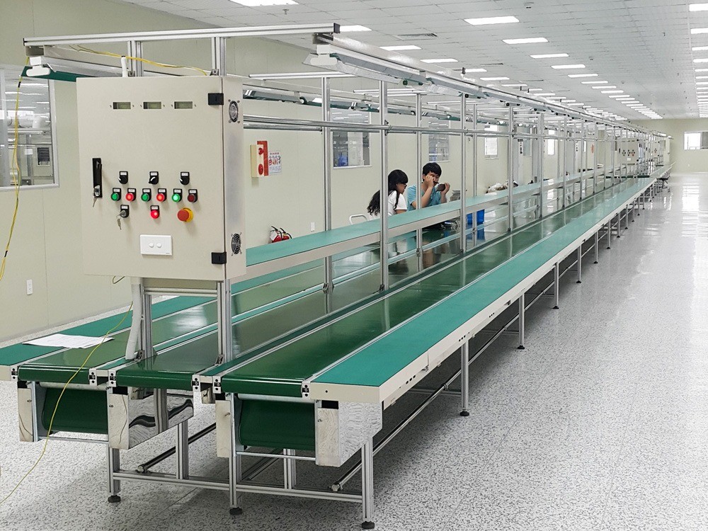 Hệ Thống Băng Tải Công Nghiệp Hoạt Động Như Thế Nào