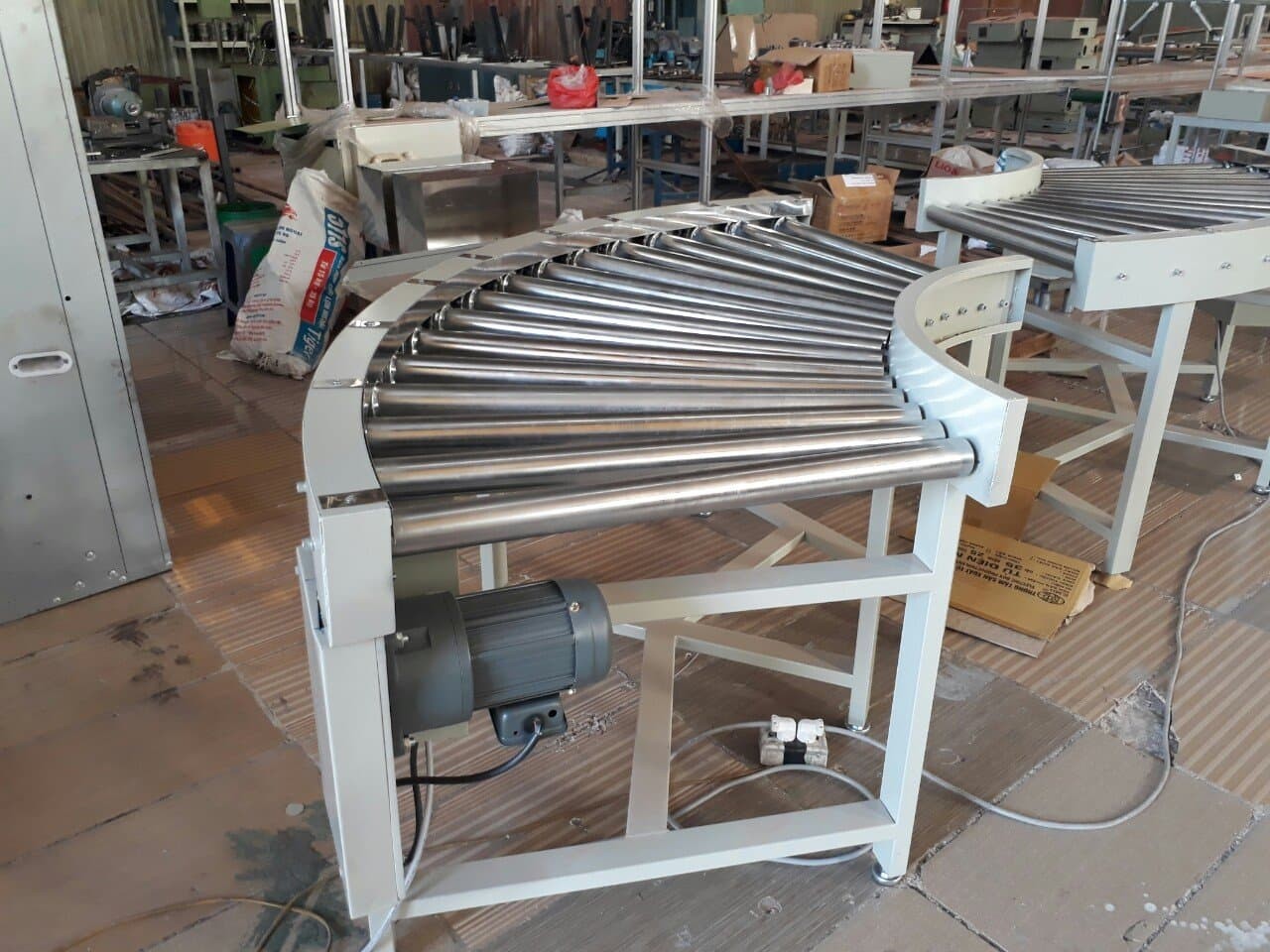 Tiêu chuẩn của băng tải con lăn góc cong